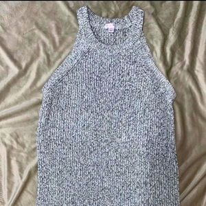 Women’s grey sweater dress, perfect for to pair with  booties.